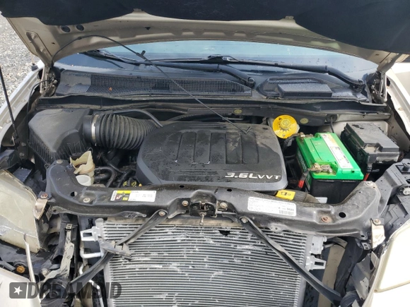 2013 Dodge Grand Caravan SE with VIN 2C4RDGBG2DR791593, listed as a Copart auction lot 51997165 with 84,959 mi miles and Salvage Title. Bid and sale history available at DreamBid. Image 12.