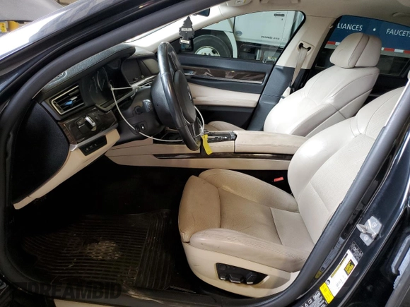 2012 BMW 7 Series 750i xDrive with VIN WBAKC6C56CC396851, listed as a Copart auction lot 64007085 with 149,218 mi miles and Clean title. Bid and sale history available at DreamBid. Image 7.