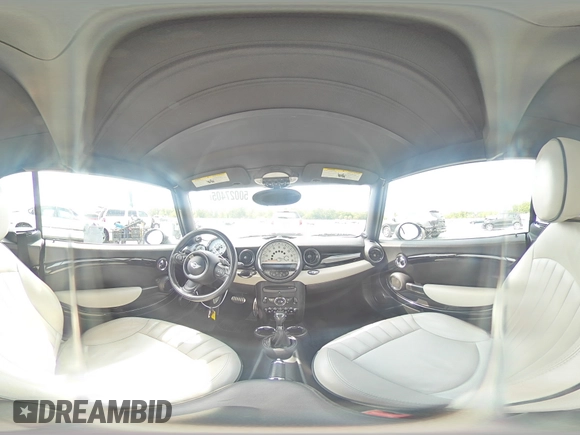 2012 MINI Convertible S with VIN WMWZP3C56CT250886, listed as a Copart auction lot 50027405 with 92,990 mi miles and Salvage title. Bid and sale history available at DreamBid. Image 14.