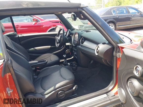 2011 MINI Convertible with VIN WMWZN3C57BTZ89303, listed as a IAAI auction lot 42352242 with 146,448 mi miles and . Bid and sale history available at DreamBid. Image 5.