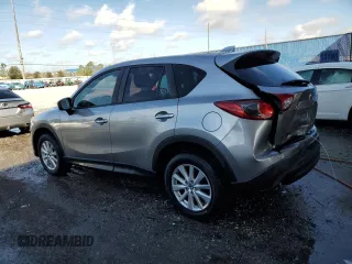 2014 Mazda CX-5 Touring with VIN JM3KE2CY8E0305641, listed as a Copart auction lot 42617165 with 107,336 mi miles and Salvage Title. Bid and sale history available at carsss.com. Image 2.