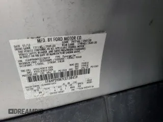 2012 Ford Taurus SEL z VIN 1FAHP2HW7CG138459, wystawiony jako Copart lot #53170075 z przebiegiem 194 617 mil mil oraz Czysty tytuł • Clean title. Historia ofert i sprzedaży dostępna na DreamBid. Obrazek 12.