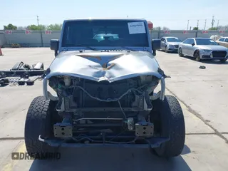 2014 Jeep Wrangler Sport with VIN 1C4AJWAG9EL155409, listed as a IAAI auction lot 41869906 with 102,400 mi miles and . Bid and sale history available at carsss.com. Image 13.