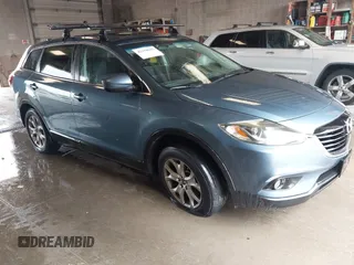 2014 Mazda CX-9 Touring with VIN JM3TB3CA0E0447066, listed as a IAAI auction lot 42350587 with 162,707 mi miles and . Bid and sale history available at DreamBid. Image 1.
