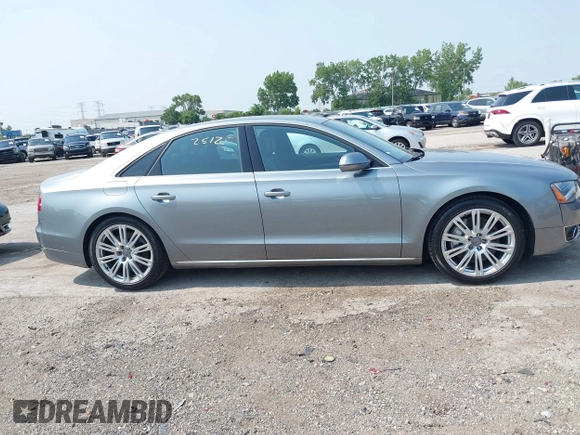2013 Audi A8 4.0L with VIN WAUA2AFD5DN021950, listed as a IAAI auction lot 42472512 with 126,964 mi miles and . Bid and sale history available at DreamBid. Image 13.