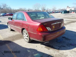 2002 Toyota Avalon XL with VIN 4T1BF28B82U216940, listed as a IAAI auction lot 41841874 with 298,982 mi miles and . Bid and sale history available at DreamBid. Image 3.