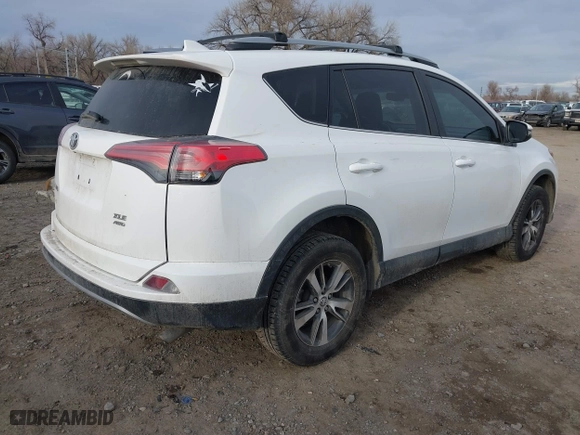 2018 Toyota RAV4 XLE with VIN 2T3RFREV2JW777906, listed as a IAAI auction lot 41164038 with 89,049 mi miles. Bid and sale history available at carsss.com. Image 4.