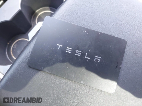2023 Tesla Model Y Long Range with VIN 7SAYGDEE0PA111430, listed as a IAAI auction lot 42156924 with 35,950 mi miles and . Bid and sale history available at DreamBid. Image 11.