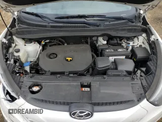 2015 Hyundai Tucson GLS with VIN KM8JT3AF0FU039863, listed as a Copart auction lot 51347815 with 104,469 mi miles and Salvage Title. Bid and sale history available at DreamBid. Image 12.