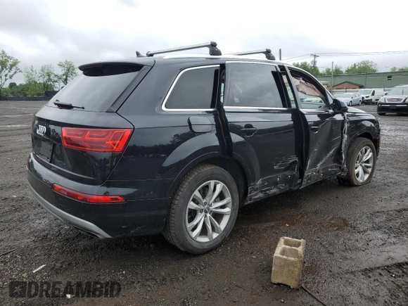 2019 Audi Q7 Premium with VIN WA1AHAF75KD024615, listed as a Copart auction lot 61334565 with 56,833 mi miles and Salvage title. Bid and sale history available at DreamBid. Image 3.