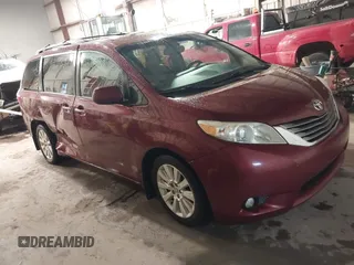 2015 Toyota Sienna Ltd with VIN 5TDDK3DC9FS121889, listed as a IAAI auction lot 41739208 with 194,548 mi miles. Bid and sale history available at carsss.com. Image 1.