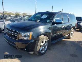 2007 Chevrolet Suburban LT with VIN 1GNFC16037R407726, listed as a IAAI auction lot 41480221 with 247,857 mi miles and . Bid and sale history available at DreamBid. Image 2.