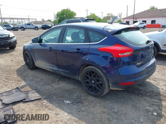 2016 Ford Focus Titanium with VIN 1FADP3N26GL206866, listed as a IAAI auction lot 42403015 with 95,753 mi miles and . Bid and sale history available at DreamBid. Image 3.