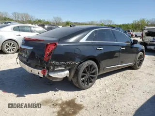 2016 Cadillac XTS Luxury Collection with VIN 2G61N5S37G9197536, listed as a Copart auction lot 52705785 with 143,434 mi miles and Salvage title. Bid and sale history available at DreamBid. Image 3.