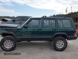 1999 Jeep Cherokee Sport with VIN 1J4FF68S1XL555463, listed as a IAAI auction lot 41898076 with 206,656 mi miles. Bid and sale history available at carsss.com. Image 14.