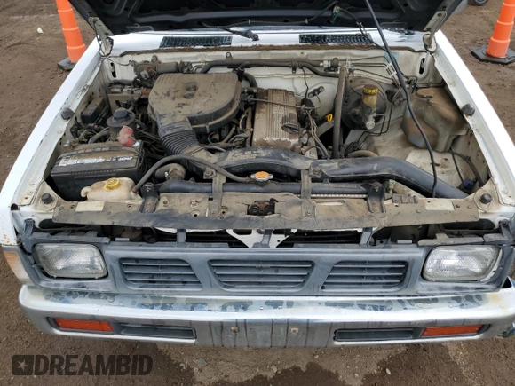 1997 Nissan Frontier XE with VIN 1N6SD16S8VC426940, listed as a Copart auction lot 55860235 with 242,265 mi miles and Salvage title. Bid and sale history available at DreamBid. Image 11.