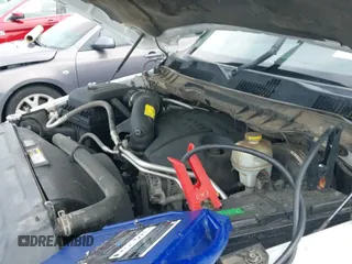 2014 Ram 1500 Longhorn z VIN 1C6RR7PT4ES277629, wystawiony jako IAAI lot #42807635 z przebiegiem 162 029 mil mil oraz . Historia ofert i sprzedaży dostępna na DreamBid. Obrazek 21.