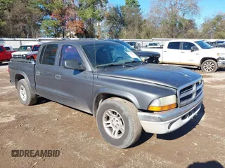 2003 Dodge Dakota SLT with VIN 1D7HL48X03S174569, listed as a IAAI auction lot 41159169 with 156,551 mi miles. Bid and sale history available at carsss.com. Image 1.