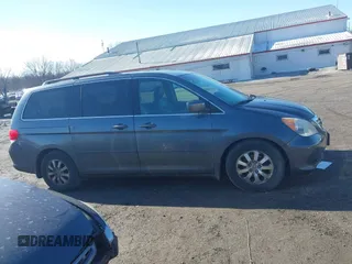2010 Honda Odyssey EX-L with VIN 5FNRL3H68AB038541, listed as a IAAI auction lot 41813473 with 206,914 mi miles. Bid and sale history available at carsss.com. Image 13.