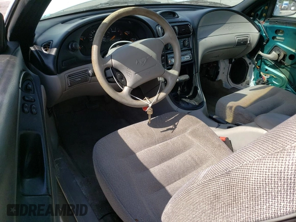 1996 Ford Mustang with VIN 1FALP4041TF206244, listed as a Copart auction lot 56311934 with 123,572 mi miles and Salvage Title. Bid and sale history available at carsss.com. Image 8.
