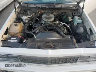 1984 Chevrolet El Camino z VIN 1GCCW80H6ER150486, wystawiony jako Copart lot #76031834 z przebiegiem 77 554 mil mil oraz Szkoda całkowita • Salvage title. Historia ofert i sprzedaży dostępna na DreamBid. Obrazek 11.