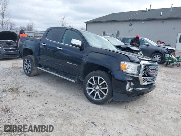 2021 GMC Canyon 4WD Denali with VIN 1GTG6EEN9M1221529, listed as a IAAI auction lot 41228498 with 67,727 mi miles. Bid and sale history available at carsss.com. Image 1.