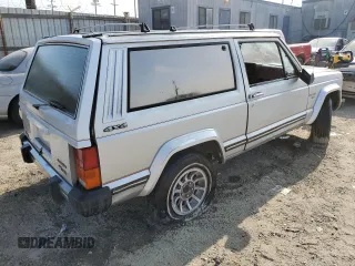 1985 Jeep Cherokee с VIN 1JCWB7742FT144063, выставлен на аукционе Copart как лот 84050844 с пробегом 80 072 миль миль и Чистый • Clean title. История ставок и продаж доступна на DreamBid. Изображение 3.