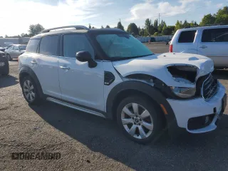 2019 MINI Countryman Cooper with VIN WMZYV5C51K3F57741, listed as a Copart auction lot 71293094 with 64,761 mi miles and Salvage Title. Bid and sale history available at carsss.com. Image 4.