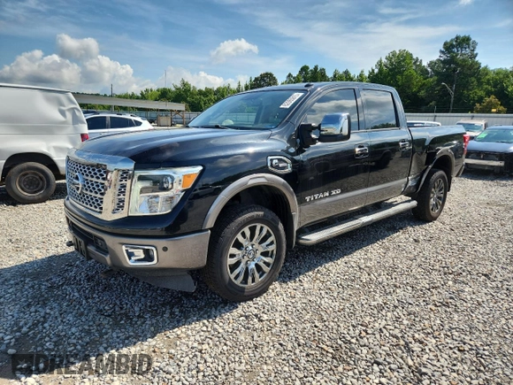 2016 Nissan Titan SV with VIN 1N6BA1F24GN511628, listed as a Copart auction lot 62965815 with 216,041 mi miles and Clean title. Bid and sale history available at DreamBid. Image 1.