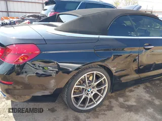 2012 BMW 6 Series 650i with VIN WBALZ3C53CC397604, listed as a IAAI auction lot 41881996 with 96,175 mi miles and . Bid and sale history available at carsss.com. Image 6.