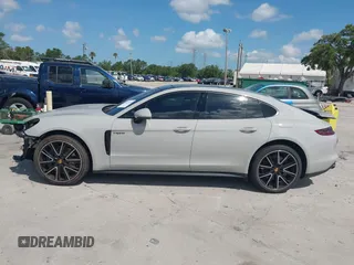 2018 Porsche Panamera 4 E-Hybrid z VIN WP0AE2A7XJL174378, wystawiony jako IAAI lot #42303125 z przebiegiem 35 636 mil mil oraz . Historia ofert i sprzedaży dostępna na DreamBid. Obrazek 14.