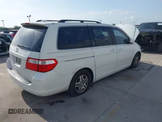 2006 Honda Odyssey EX-L with VIN 5FNRL38726B038471, listed as a IAAI auction lot 42094020 with 171,250 mi miles. Bid and sale history available at carsss.com. Image 4.