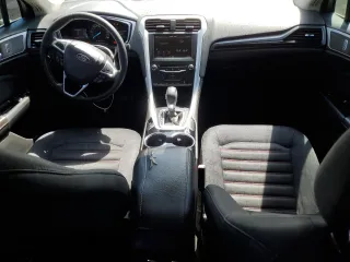 2014 Ford Fusion SE Hybrid with VIN 3FA6P0LUXER296906, listed as a Copart auction lot 62265414 with 135,332 mi miles and Salvage title. Bid and sale history available at DreamBid. Image 8.
