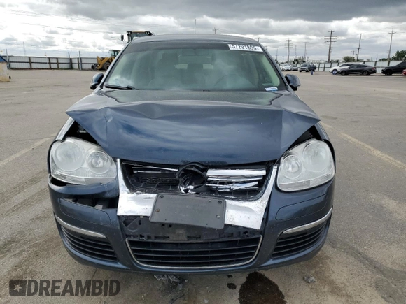 2010 Volkswagen Jetta Limited Edition with VIN 3VWRZ7AJ0AM099928, listed as a Copart auction lot 57291895 with 118,451 mi miles and Salvage title. Bid and sale history available at DreamBid. Image 5.