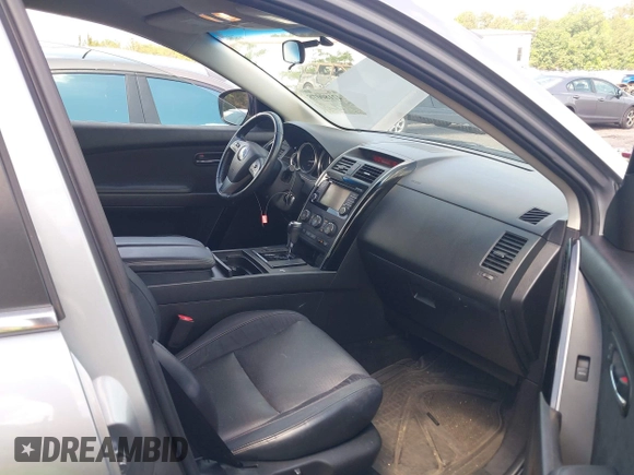 2015 Mazda CX-9 Touring with VIN JM3TB2CA2F0451180, listed as a IAAI auction lot 42180078 with 112,804 mi miles and . Bid and sale history available at carsss.com. Image 5.