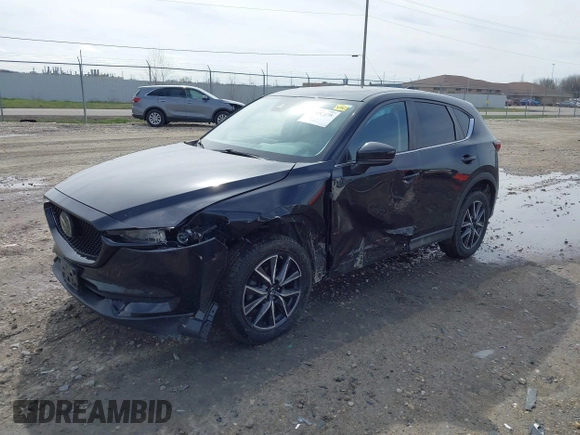 2018 Mazda CX-5 Touring with VIN JM3KFBCMXJ0438177, listed as a IAAI auction lot 42152275 with 65,434 mi miles and . Bid and sale history available at carsss.com. Image 17.