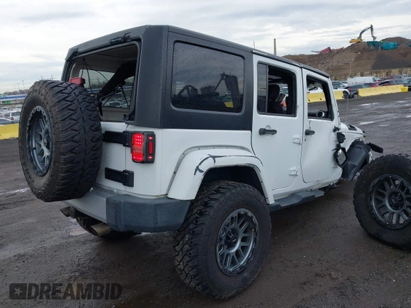 2015 Jeep Wrangler Unlimited Sahara with VIN 1C4BJWEG5FL518191, listed as a IAAI auction lot 41914581 with 107,433 mi miles. Bid and sale history available at carsss.com. Image 17.