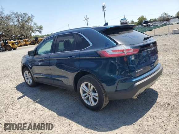 2020 Ford Edge SEL с VIN 2FMPK3J9XLBA59093, выставлен на аукционе Copart как лот 52542645 с пробегом 128 059 миль миль и Чистый • Clean title. История ставок и продаж доступна на DreamBid. Изображение 2.