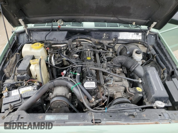 1996 Jeep Cherokee Country with VIN 1J4FJ78S3TL180304, listed as a Copart auction lot 45291925 with 162,876 mi miles and Salvage Title. Bid and sale history available at carsss.com. Image 12.