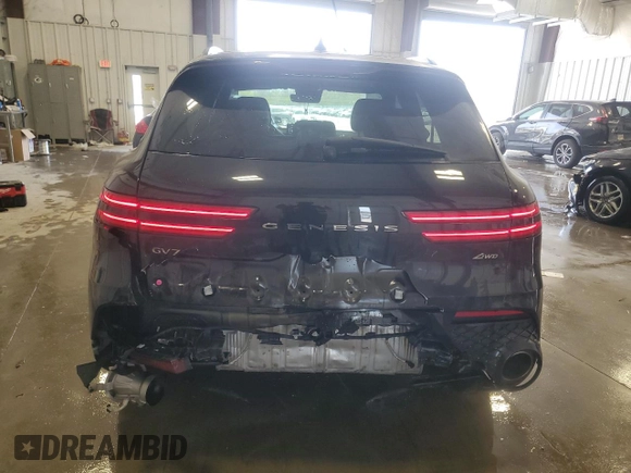 2023 Genesis GV70 2.5T z VIN KMUMADTBXPU089045, wystawiony jako Copart lot #56052135 z przebiegiem 40 142 mil mil oraz Szkoda całkowita • Salvage title. Historia ofert i sprzedaży dostępna na DreamBid. Obrazek 6.
