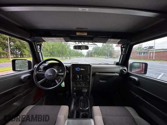 2007 Jeep Wrangler Unlimited X with VIN 1J8GA39147L156911, listed as a Copart auction lot 65987405 with 115,766 mi miles and Clean title. Bid and sale history available at DreamBid. Image 9.