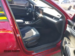 2022 Kia K5 GT-Line z VIN 5XXG64J26NG107886, wystawiony jako IAAI lot #41054102 z przebiegiem 88 516 mil mil oraz . Historia ofert i sprzedaży dostępna na DreamBid. Obrazek 5.