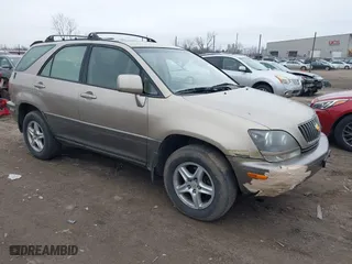 1999 Lexus RX 300 Luxury SUV with VIN JT6HF10U8X0027961, listed as a IAAI auction lot 41541961 with 246,095 mi miles. Bid and sale history available at carsss.com. Image 1.
