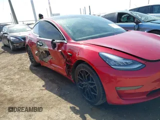 2020 Tesla Model 3 Long Range with VIN 5YJ3E1EB9LF666066, listed as a IAAI auction lot 41759976 with 69,323 mi miles. Bid and sale history available at carsss.com. Image 6.