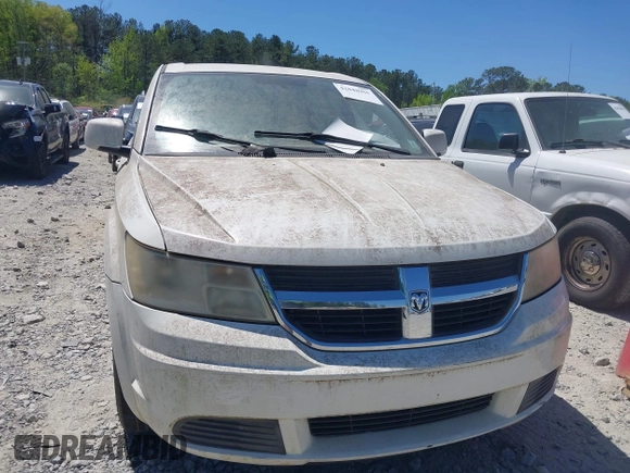 2009 Dodge Journey SXT with VIN 3D4GG57VX9T200489, listed as a IAAI auction lot 42048965 with 156,830 mi miles. Bid and sale history available at carsss.com. Image 6.