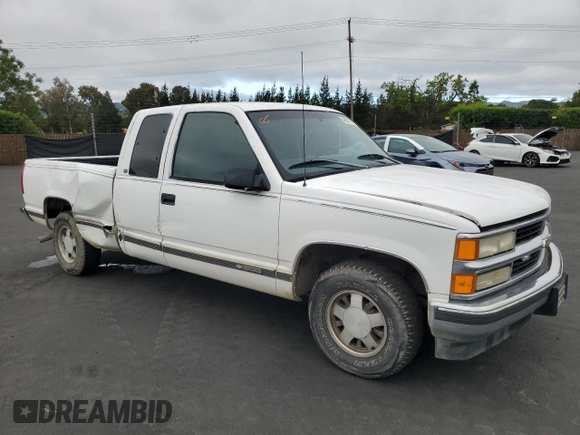 1998 Chevrolet Silverado 1500 with VIN 2GCEC19R6W1133606, listed as a Copart auction lot 54662775 with 317,437 mi miles and Salvage Title. Bid and sale history available at DreamBid. Image 4.