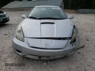 2004 Toyota Celica GT with VIN JTDDR32T040167769, listed as a Copart auction lot 71633564 with 168,797 mi miles and Clean Title. Bid and sale history available at carsss.com. Image 5.