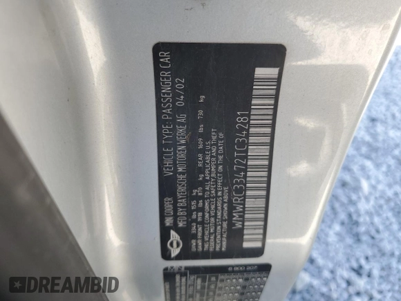 2002 MINI Hardtop with VIN WMWRC33472TC34281, listed as a Copart auction lot 71631644 with 196,947 mi miles and Salvage Title. Bid and sale history available at DreamBid. Image 14.