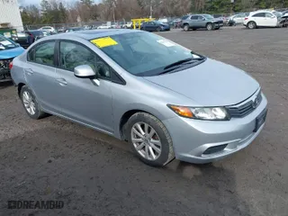 2012 Honda Civic Sdn EX-L with VIN 2HGFB2F94CH529720, listed as a IAAI auction lot 42019726 with 139,096 mi miles. Bid and sale history available at carsss.com. Image 1.