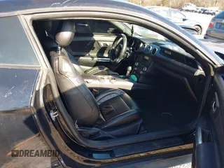 2019 Ford Mustang EcoBoost with VIN 1FA6P8TH8K5173458, listed as a IAAI auction lot 41085251 with 99,260 mi miles and . Bid and sale history available at carsss.com. Image 5.